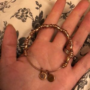 Alex and Ani rose gold bracelet.